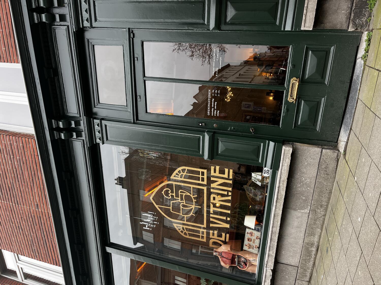 The preserved tile floor and tile walls of De Vitrine, the former butcher shop that now houses Souvenir.