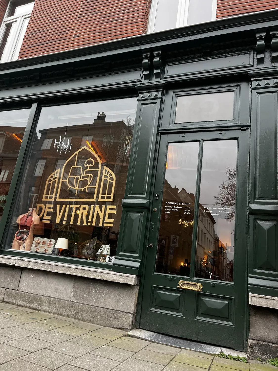 The preserved tile floor and tile walls of De Vitrine, the former butcher shop that now houses Souvenir.