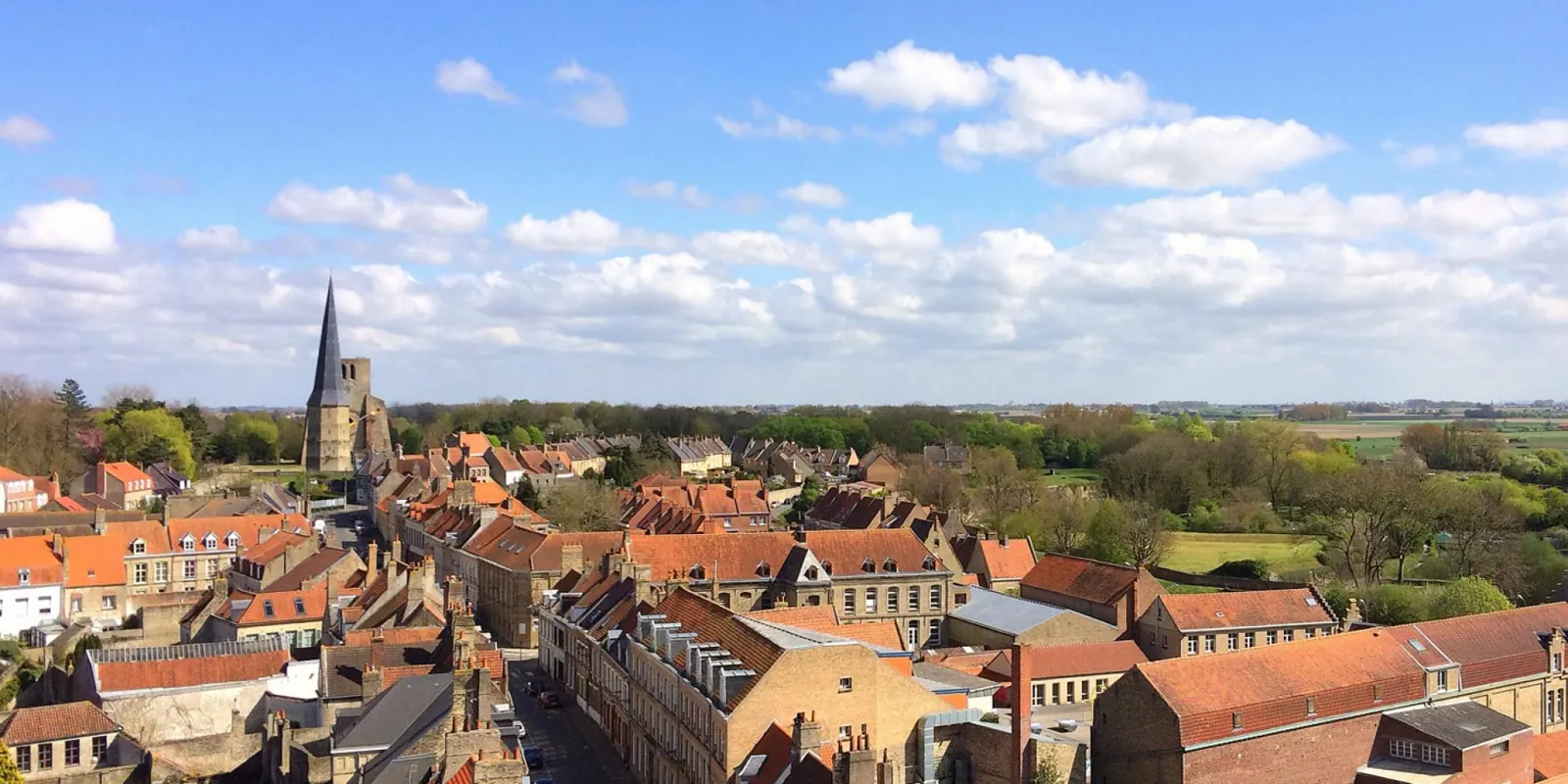Aerial view of Bergues — fortified Flemish market town with >5 km of medieval/Vauban ramparts