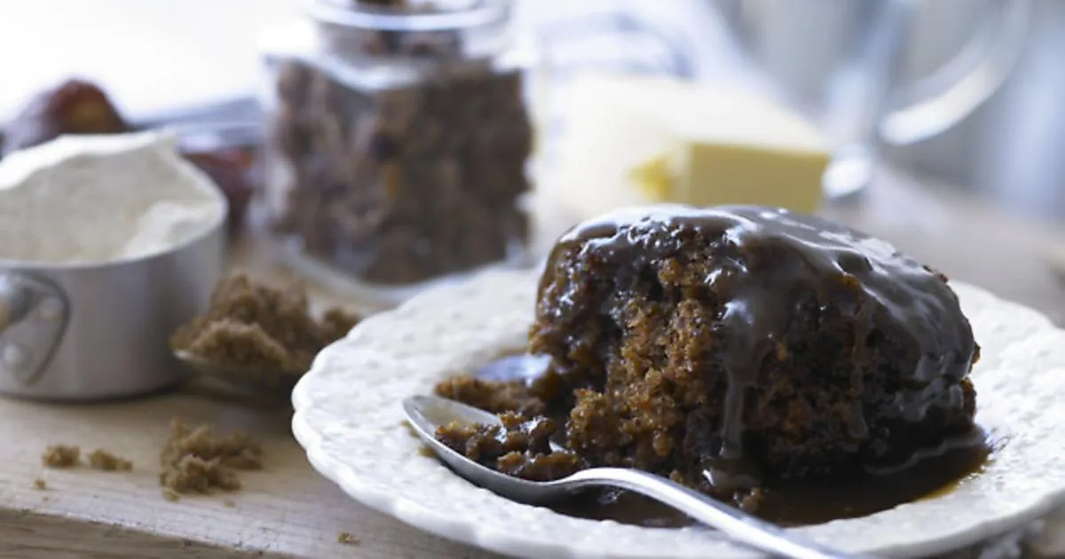 Cartmel sticky toffee pudding, warmed and slathered with cream.