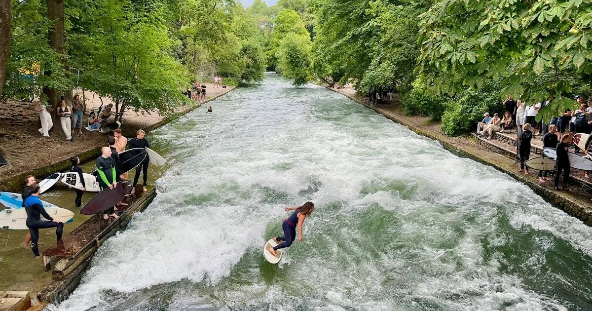 Eisbach standing wave with surfer