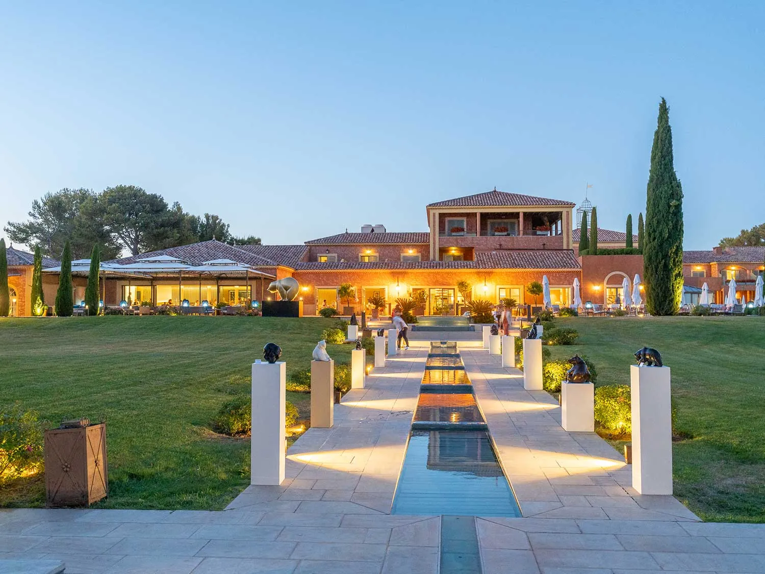 Hôtel & Spa du Castellet, ochre Tuscan-influenced buildings on a 12-hectare park.
