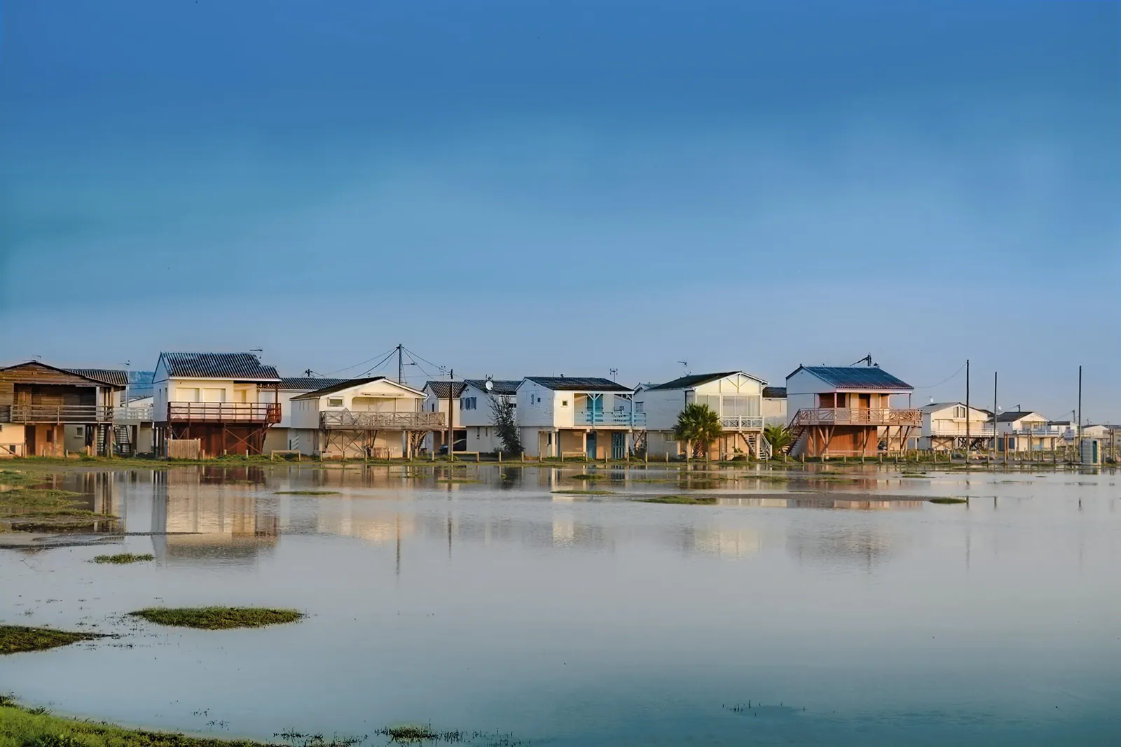 Gruissan wooden stilt chalets along the beach, Aude coast