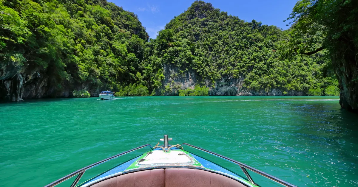 Kayaking into a limestone hong lagoon, Phang Nga Bay