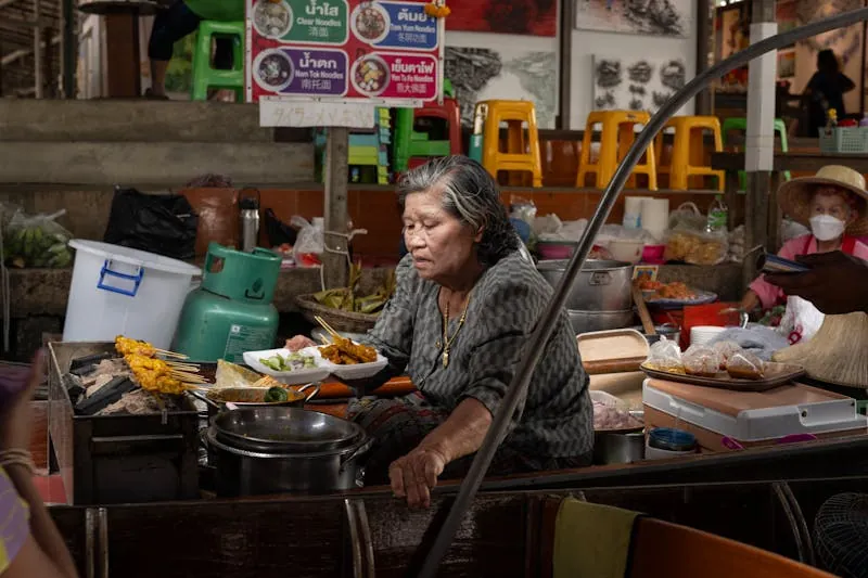 Yaowarat Chinatown street food vendors Bangkok at night