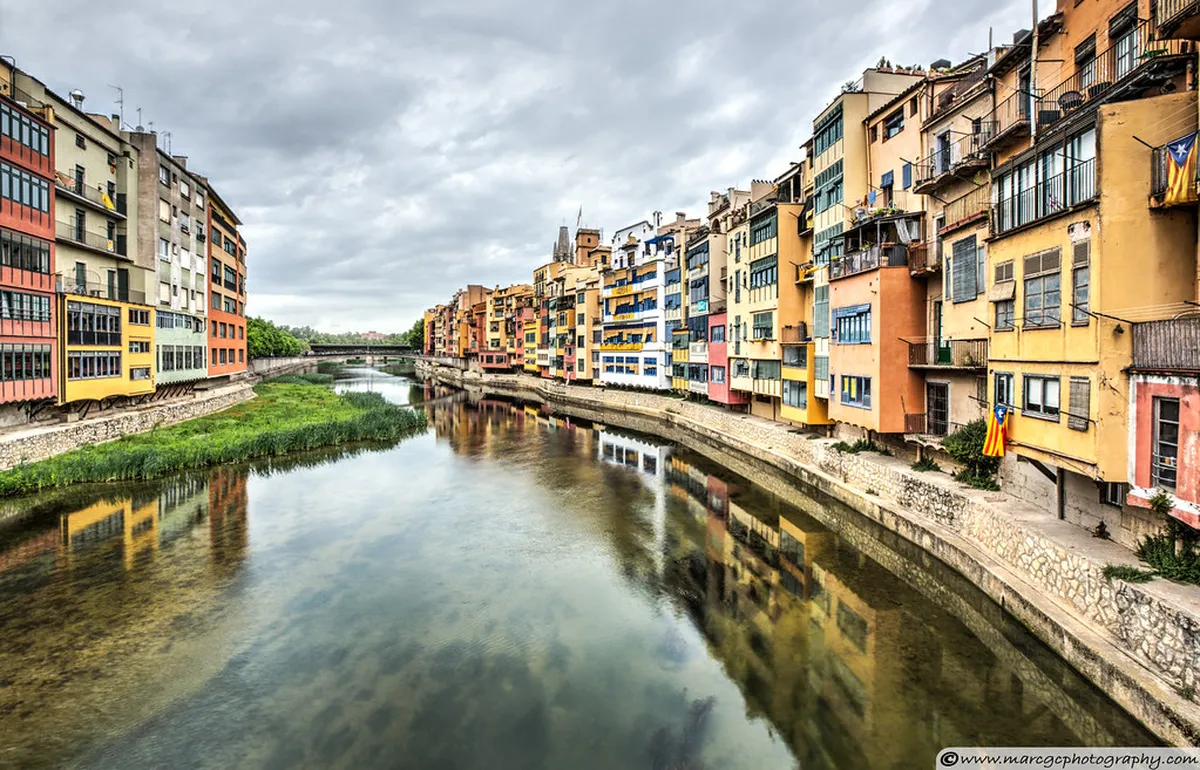 The colourful Onyar river houses seen from the Eiffel bridge, Girona