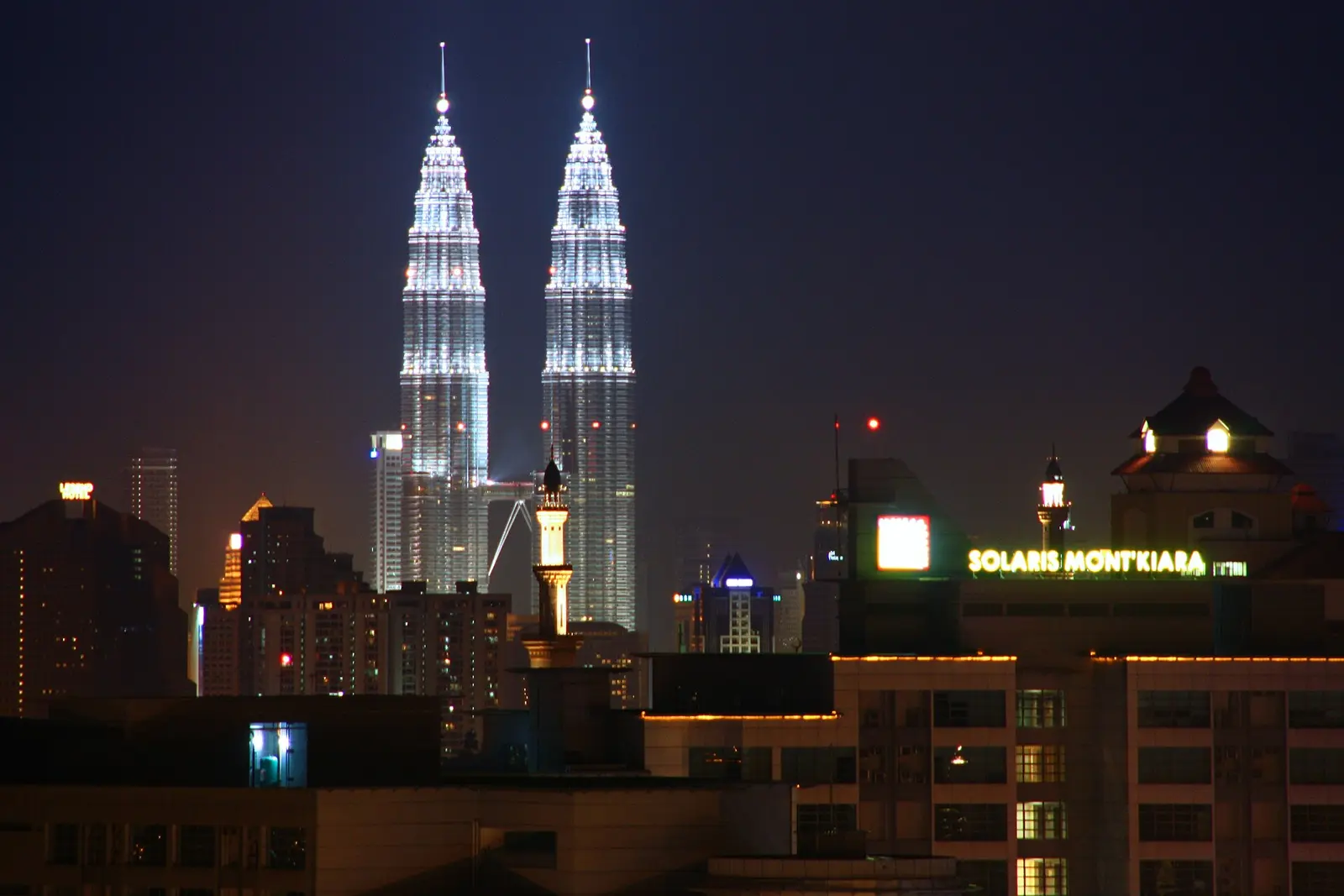 Kuala Lumpur skyline at night with the Petronas Towers