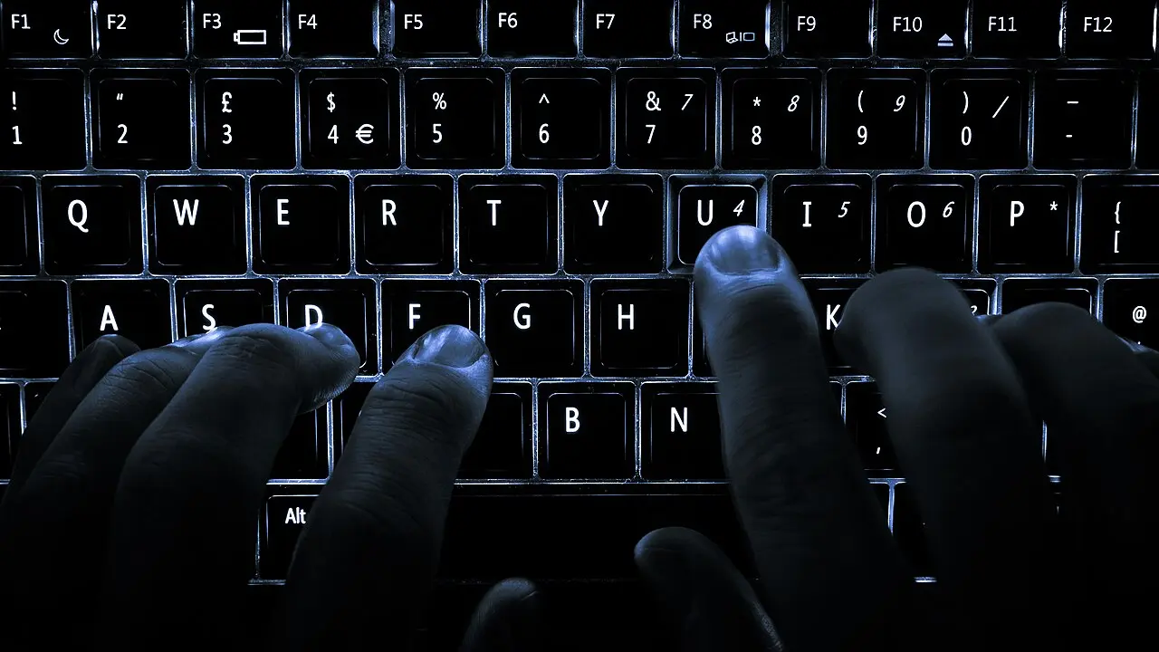 Close-up of a backlit computer keyboard