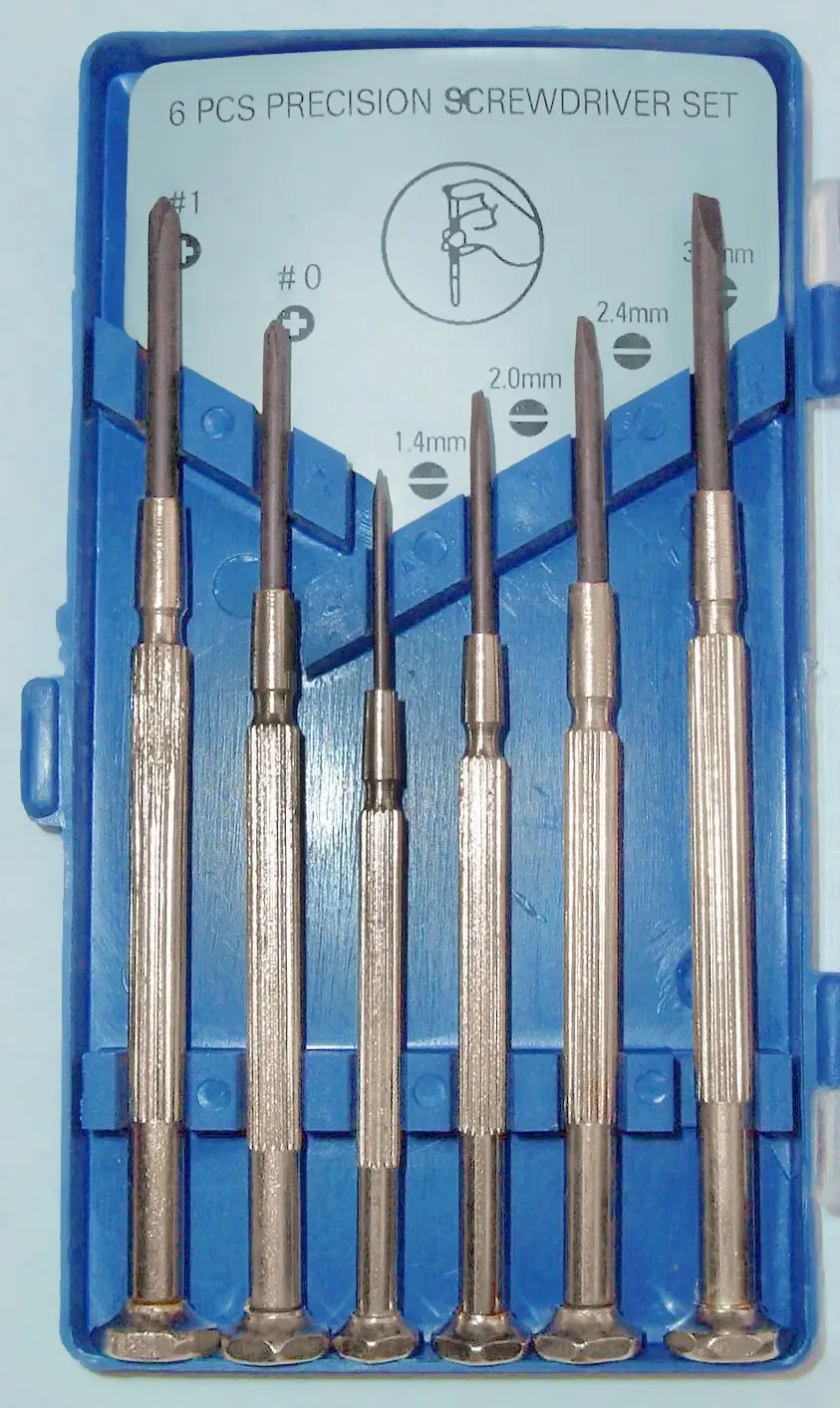 A set of precision screwdrivers laid out in order of size