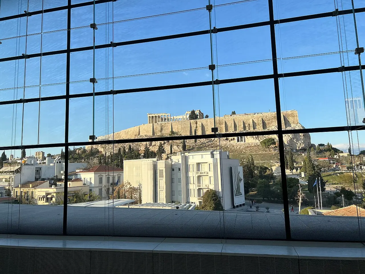 The Acropolis Museum with the Acropolis behind it