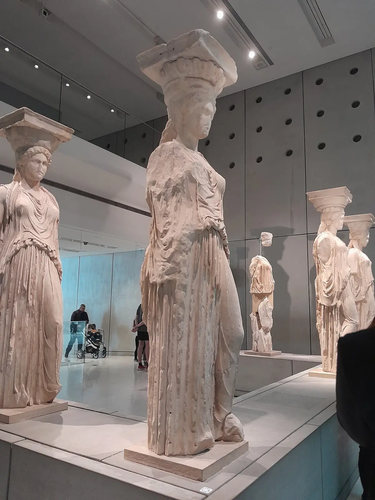 The original Caryatids displayed in the Acropolis Museum