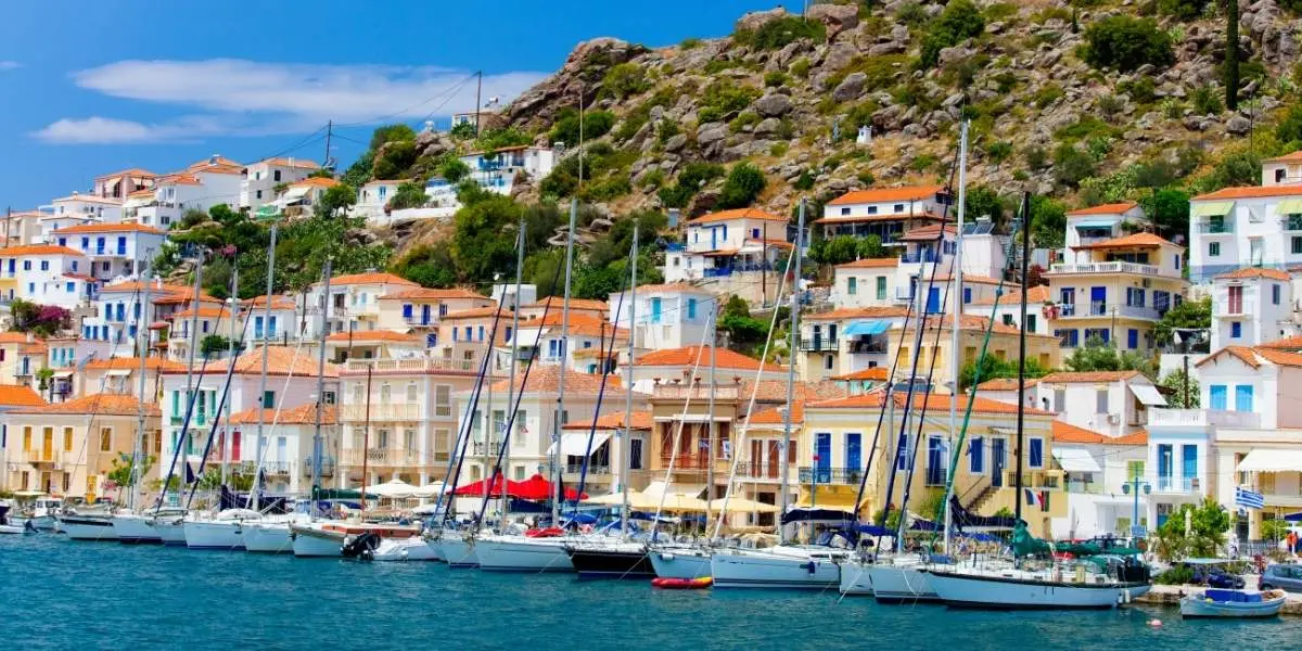 Boats moored along the Poros waterfront
