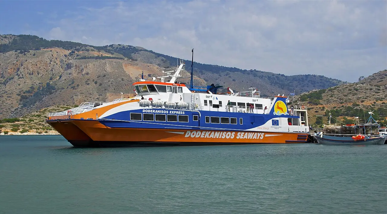 A high-speed catamaran alongside in a Greek port