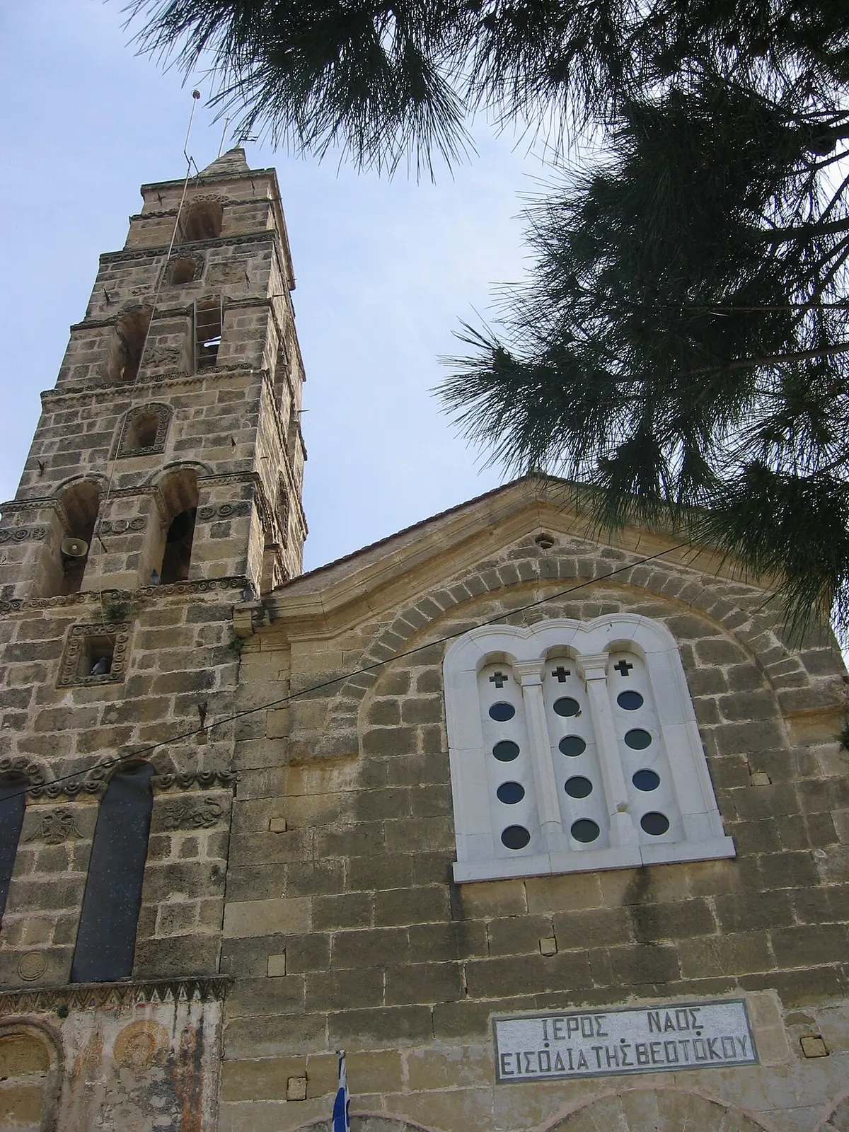 The stone belltower of the village church in Kardamyli
