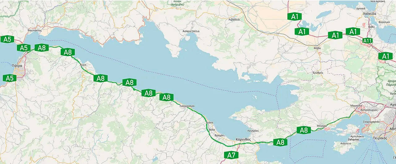 Map of the A8 Olympia Odos corridor running west from Athens past Corinth