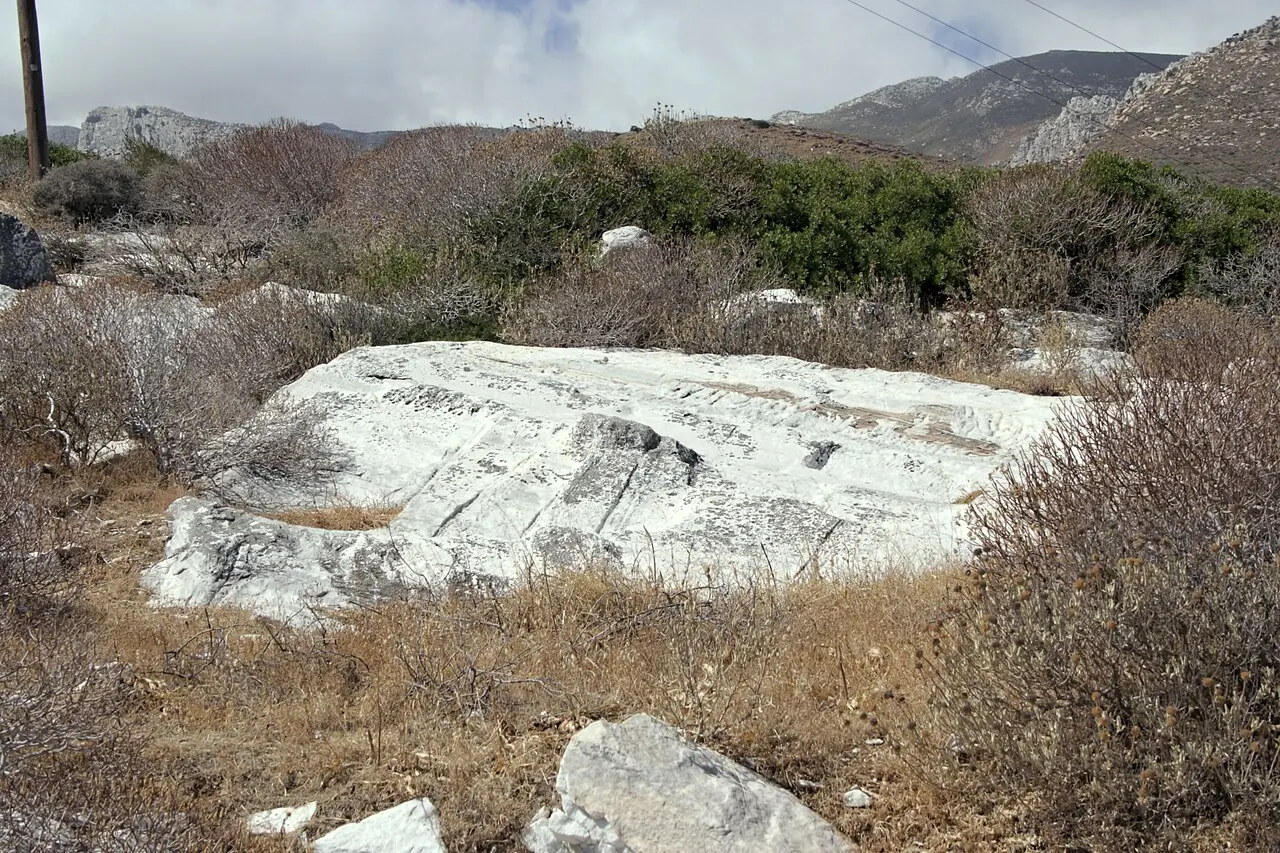 Ancient marble quarry above the large torso at Apollonas, Naxos