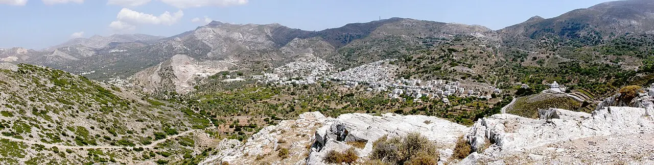 Filoti village spread across two hillsides beneath the bulk of Mount Zas on Naxos